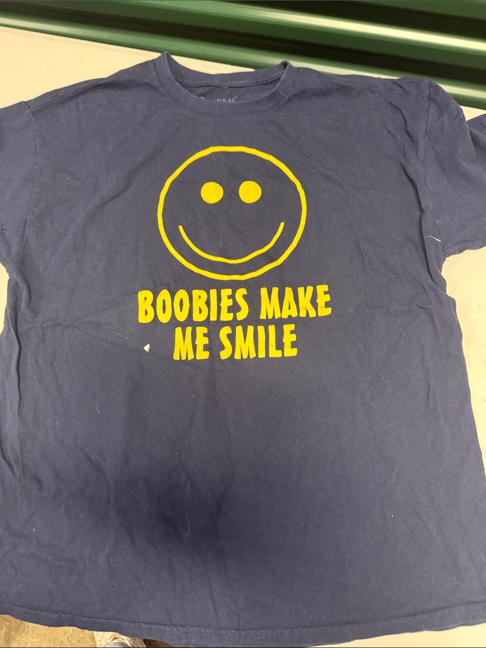 Spencer's Navy Tee with Yellow Smiley and Bold Text